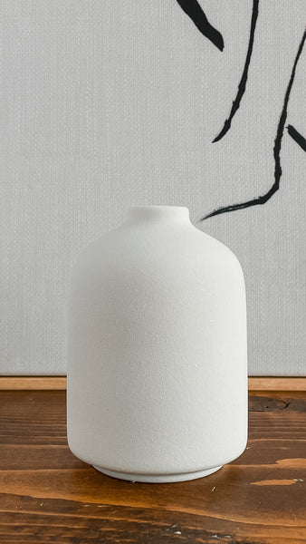 mini white bud vase close up